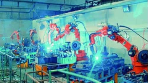 Industrial robots working on a factory floor