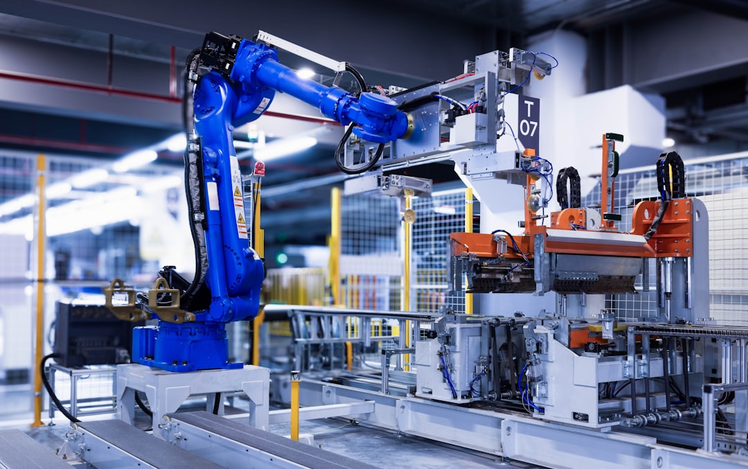 Robotic welding cell in an industrial manufacturing environment