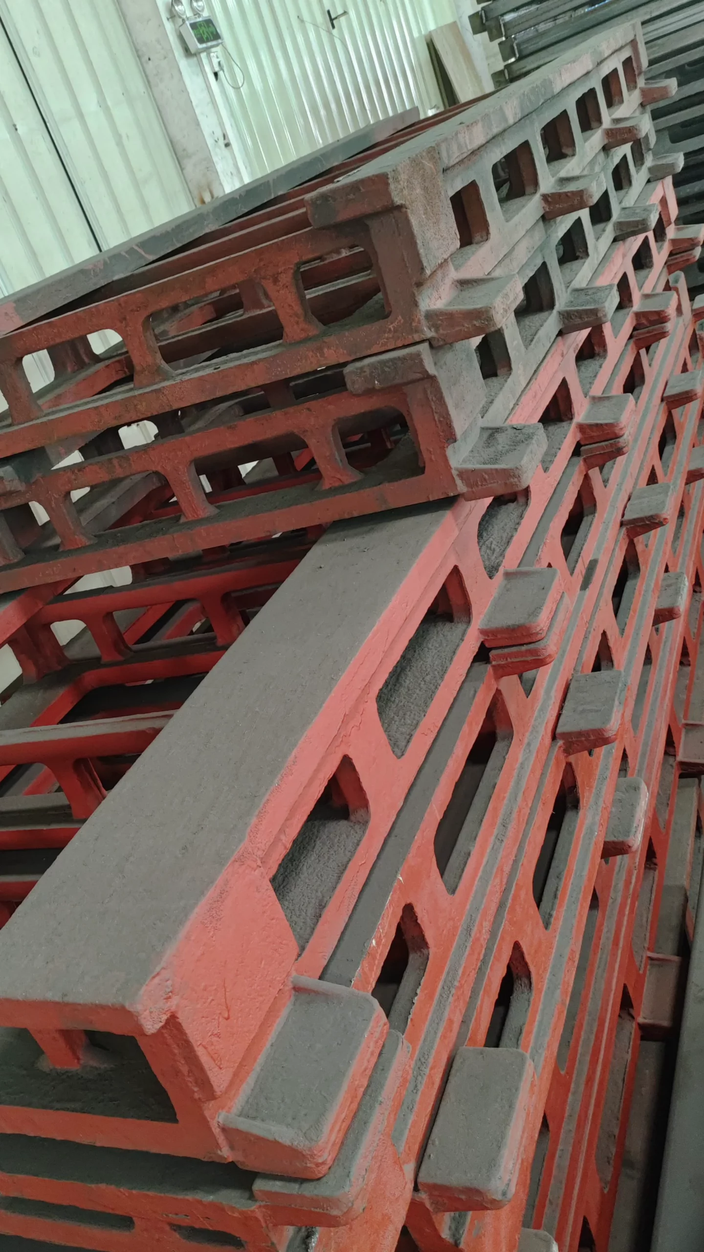 Cast structural track components before machining