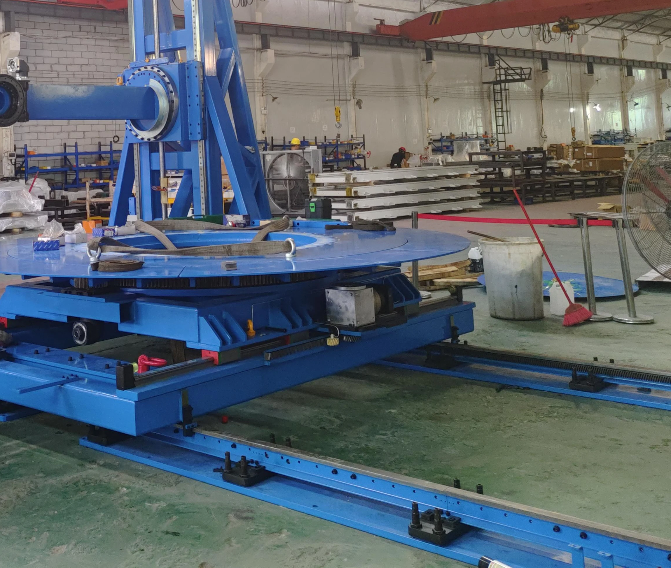 Custom gantry equipment and track modules in a production workshop