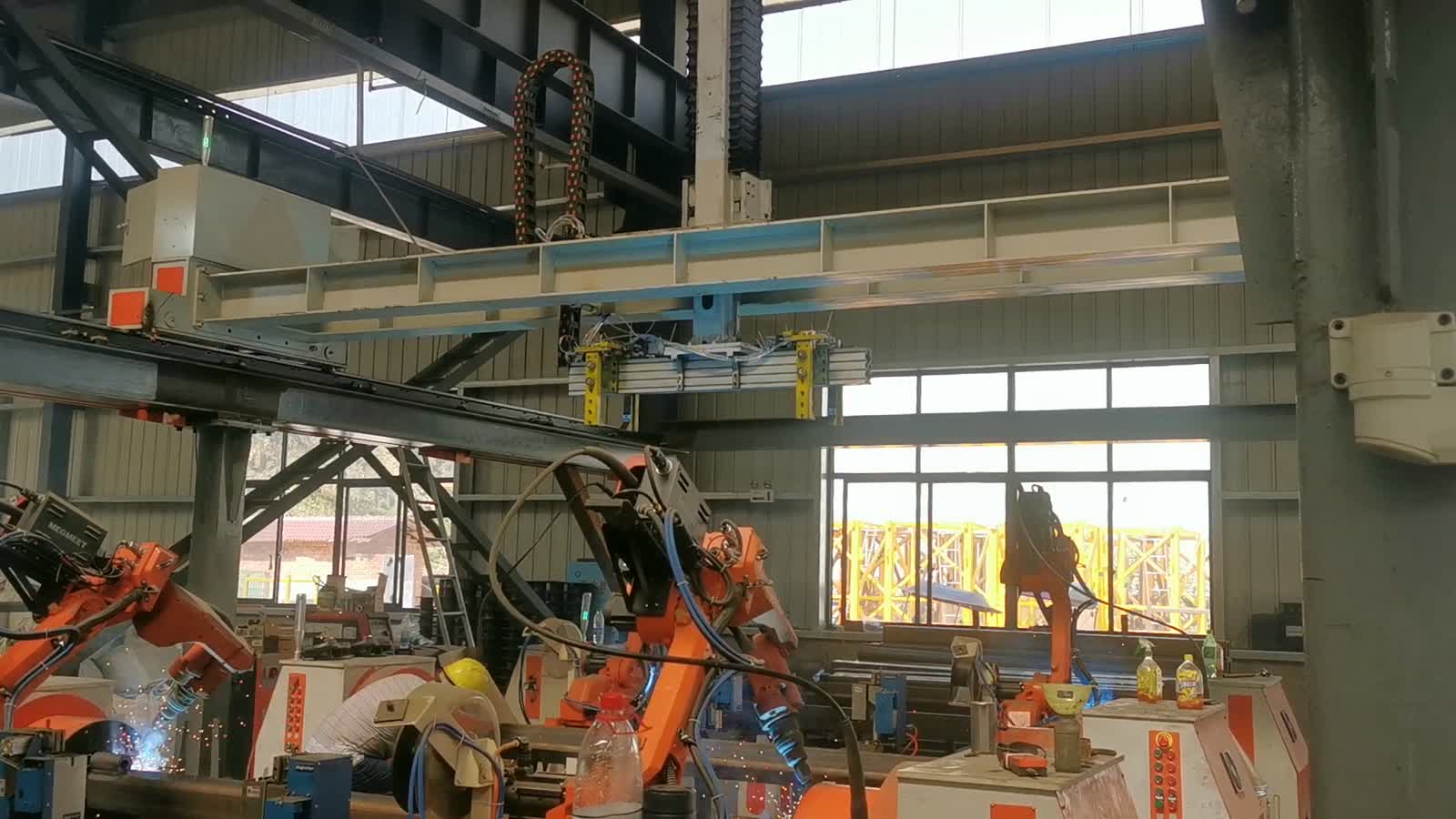 Several robot stations working in one steel-structure shop