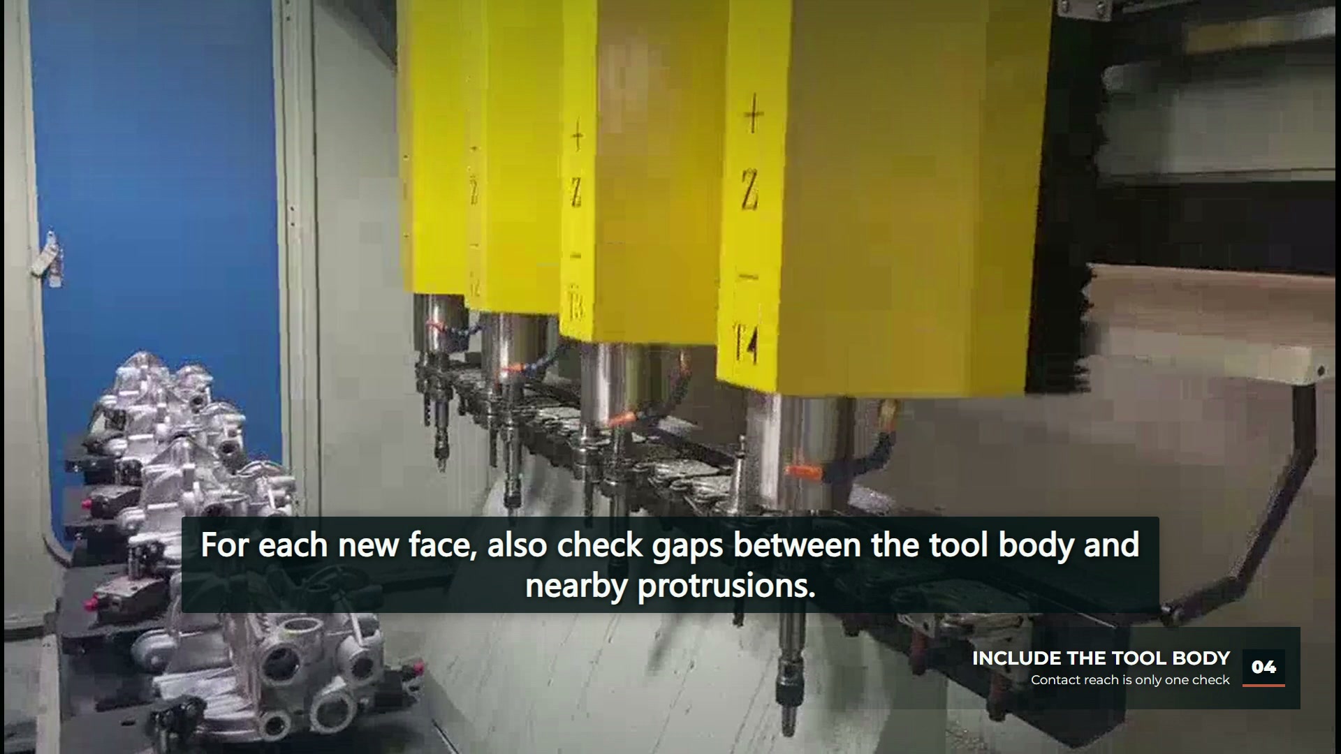 The machining heads and workpiece row with a different workpiece face presented beneath the tooling.