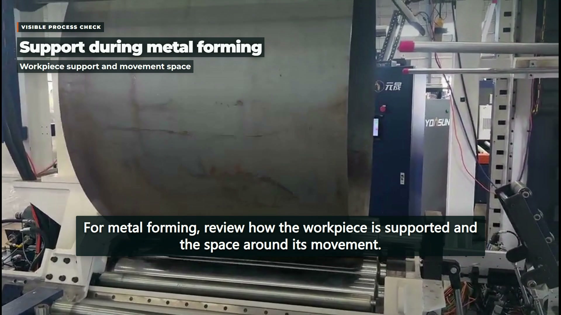 Curved metal sheet passing through horizontal forming rolls at 00:03