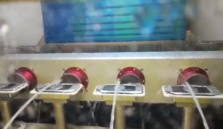 Wet processing around rotating workpiece fixtures