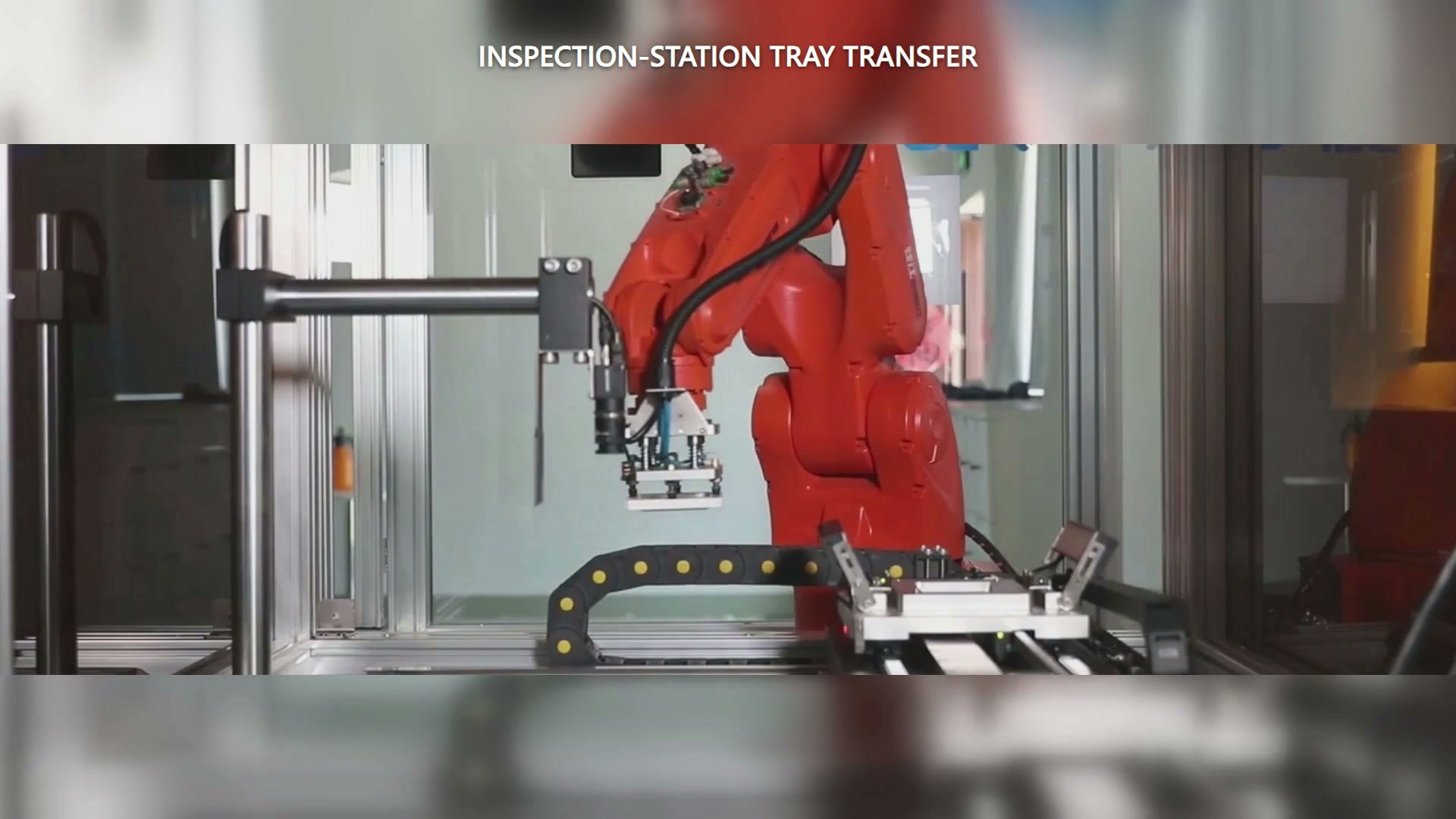 The robot end-effector moves beside the fixed camera.