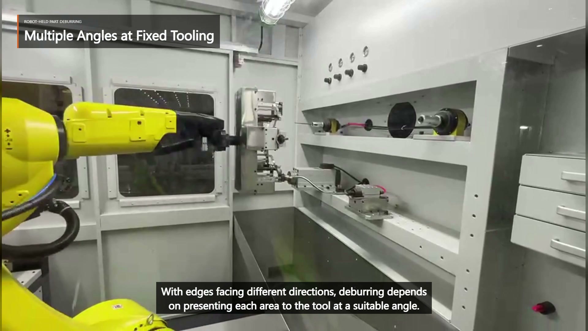 Small complex part secured on a large rectangular wrist-mounted fixture plate