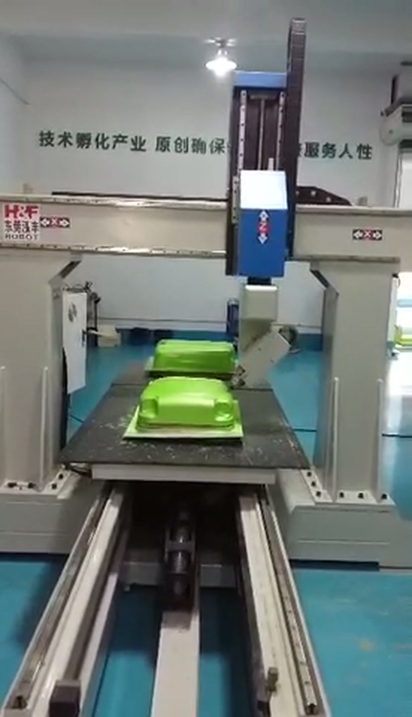 Gantry trimming cell following the edge of a green formed shell