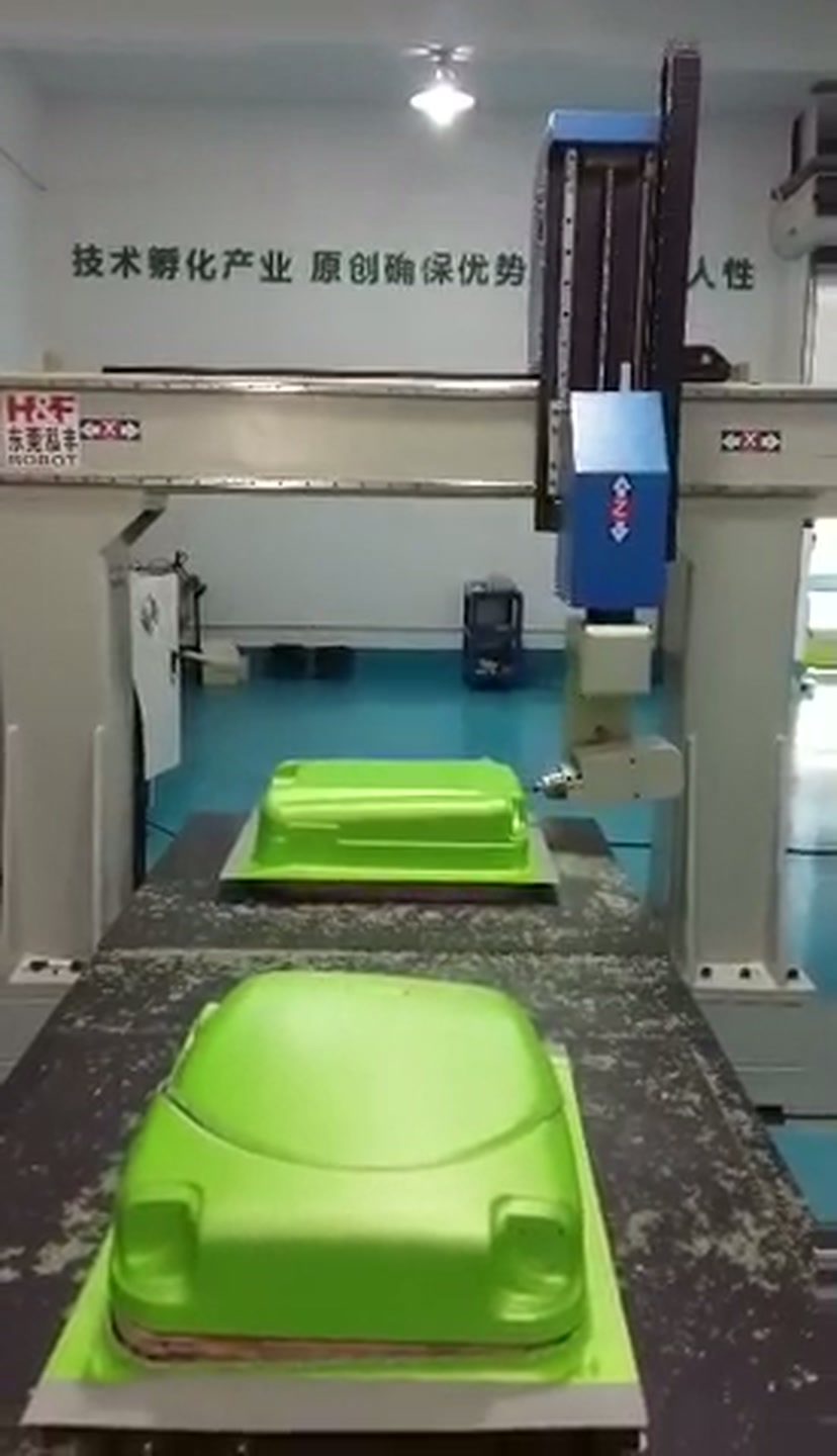 Tilting router head beside the formed shell edge